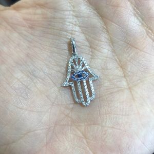 Hand of God with sapphires